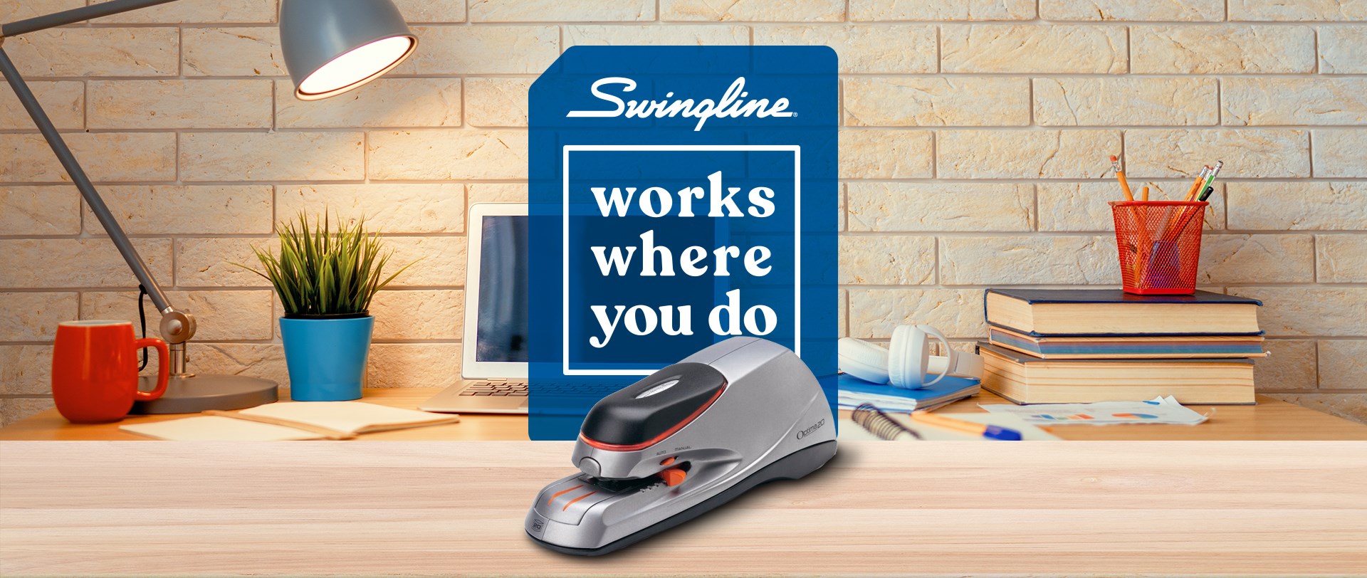 Swingline Optima® Grip Compact Electric Stapler featured on a desk